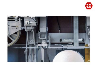 Roller band guides with integrated spray lubrication 1