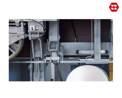 Roller band guides with integrated spray lubrication 2